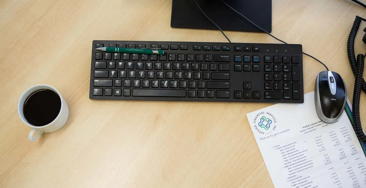 keyboard with cup of coffee